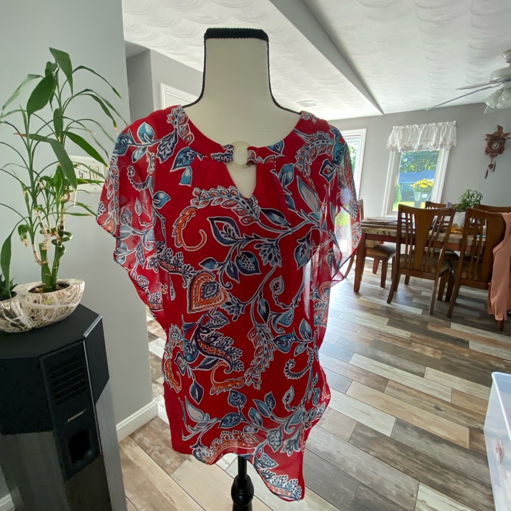 2 tops one Beige end light brown 1 red blue with flowers prints